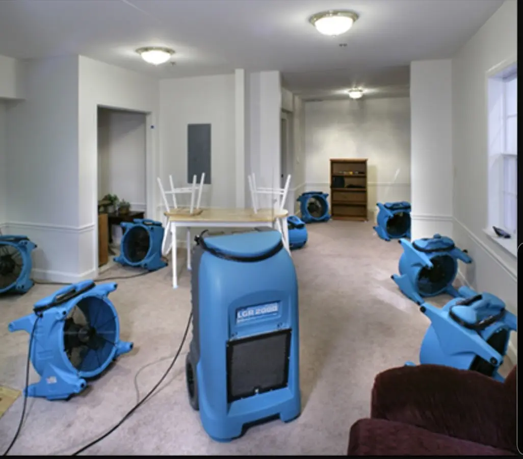 Air movers and dehumidifier setup for Water Damage Restoration in North Madison